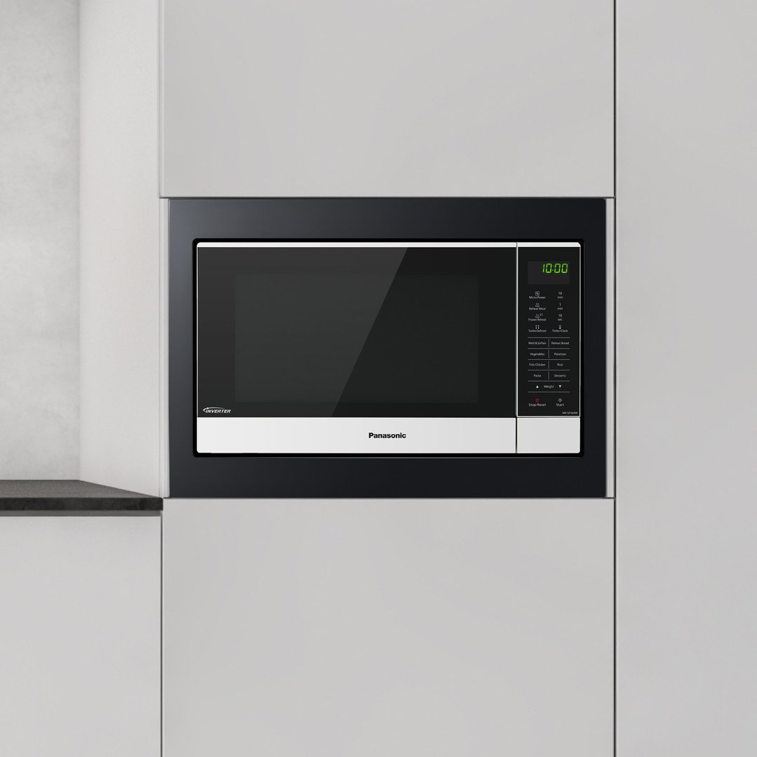 Panasonic microwave built into a light grey kitchen cabinet