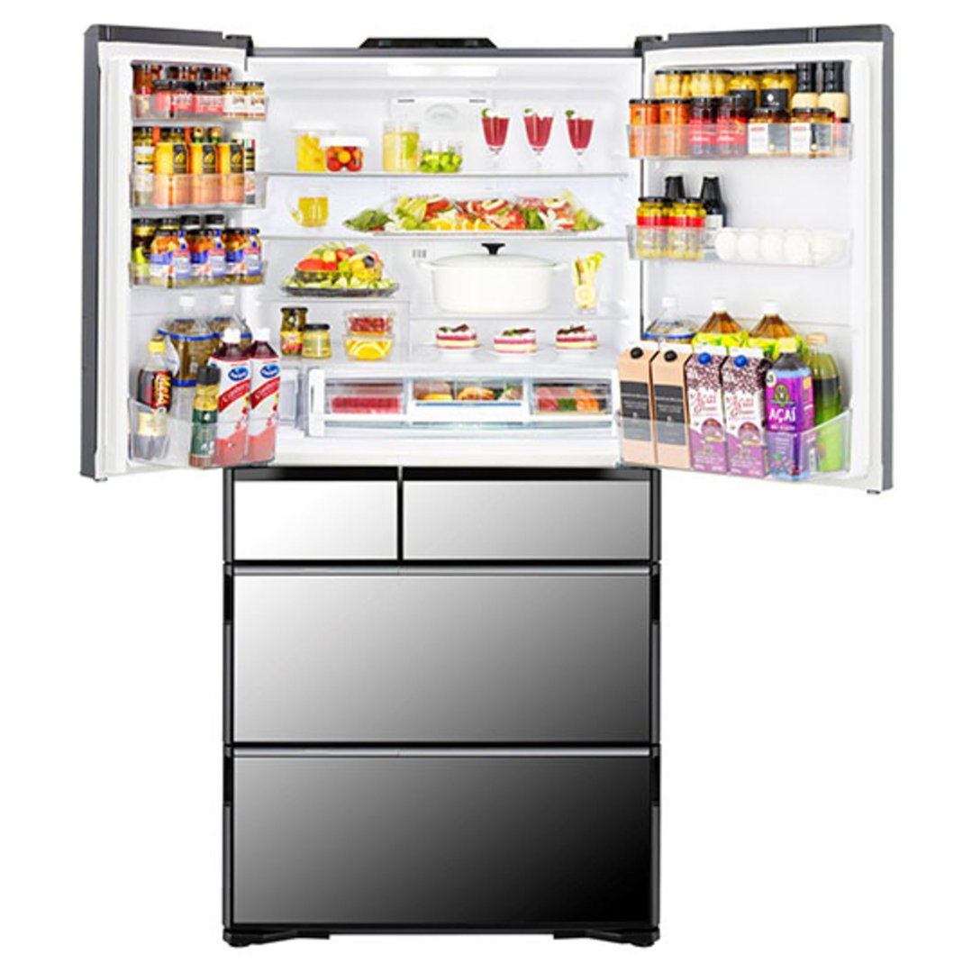 Open multi-drawer French door fridge filled with food and drinks