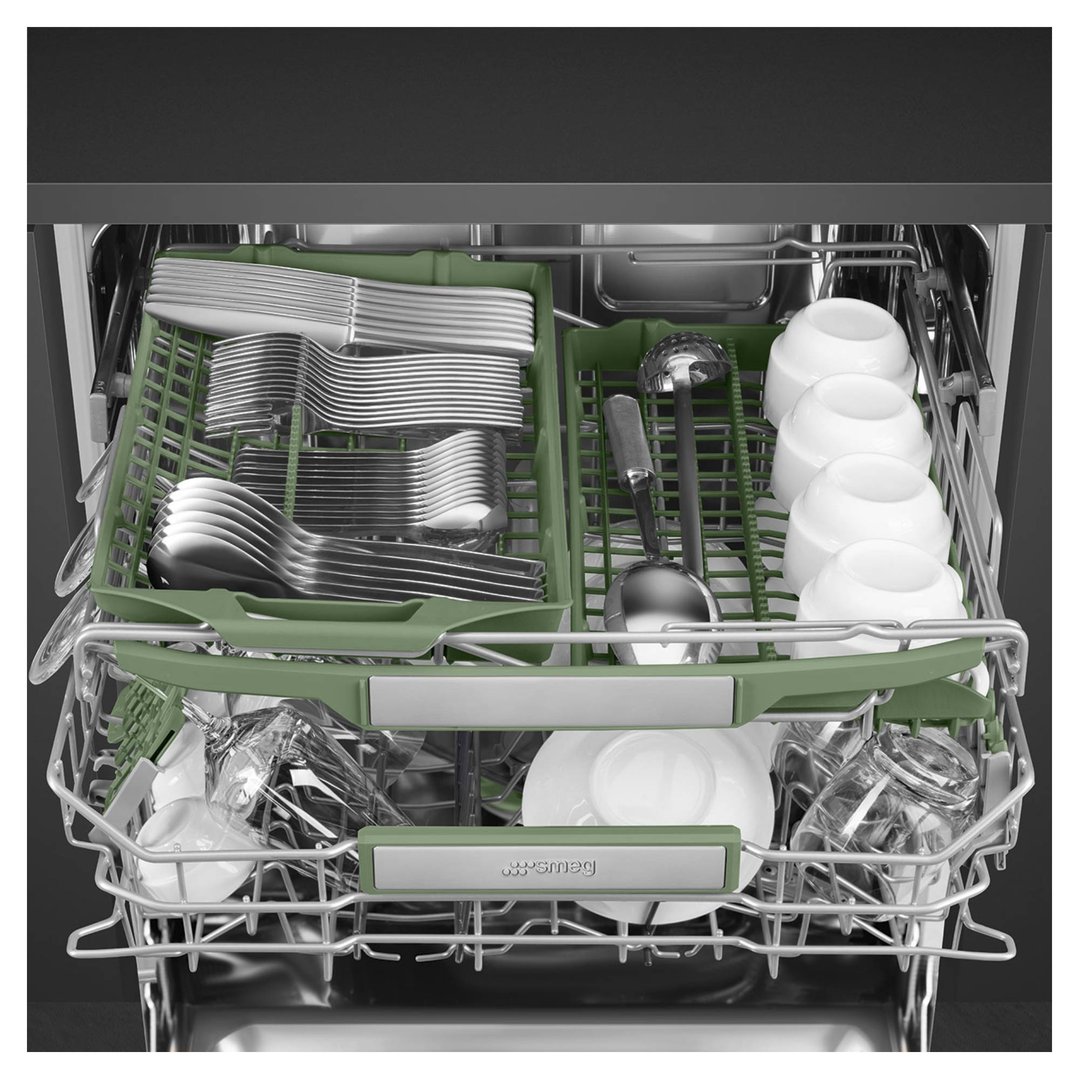 Dishwasher interior with green racks filled with cutlery, bowls, and glasses