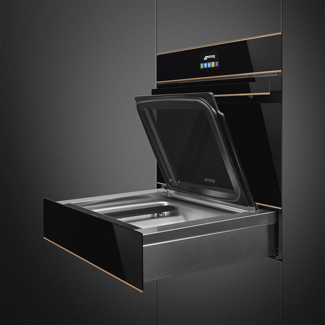 Black built-in warming drawer with an open door and a control panel above