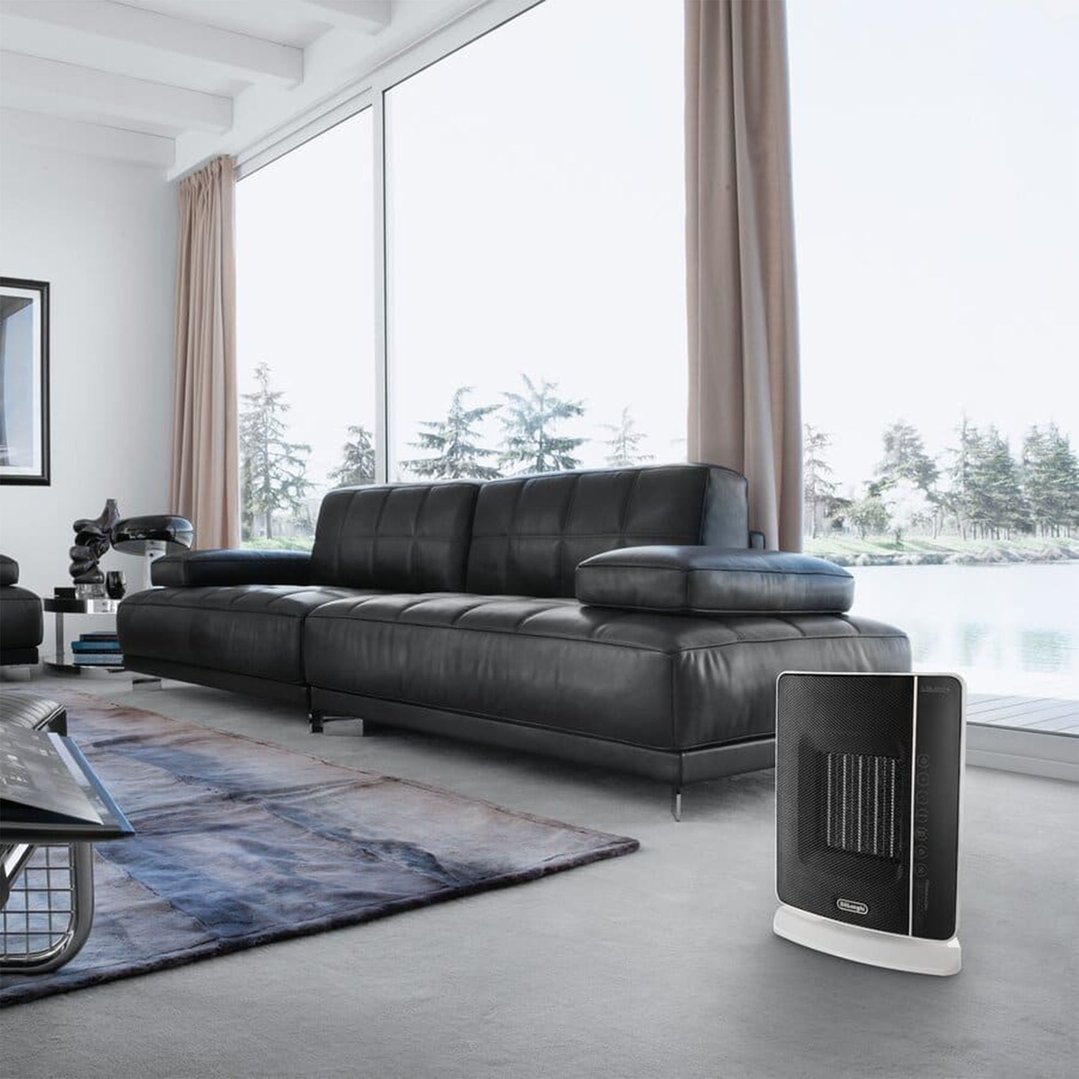 Digital Ceramic Tower Heater on the floor in a modern living room