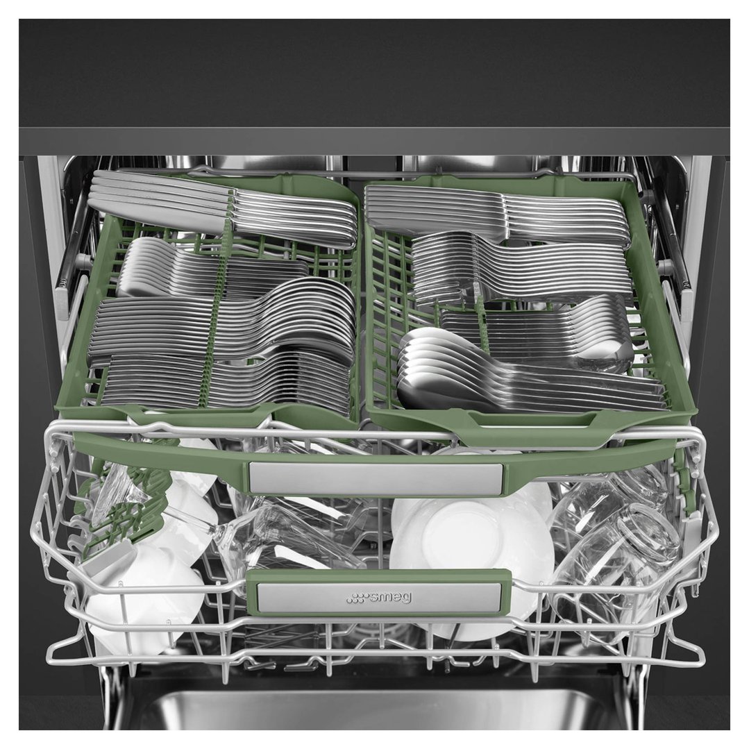 Close up of the inside of a dishwasher with cutlery and dishes