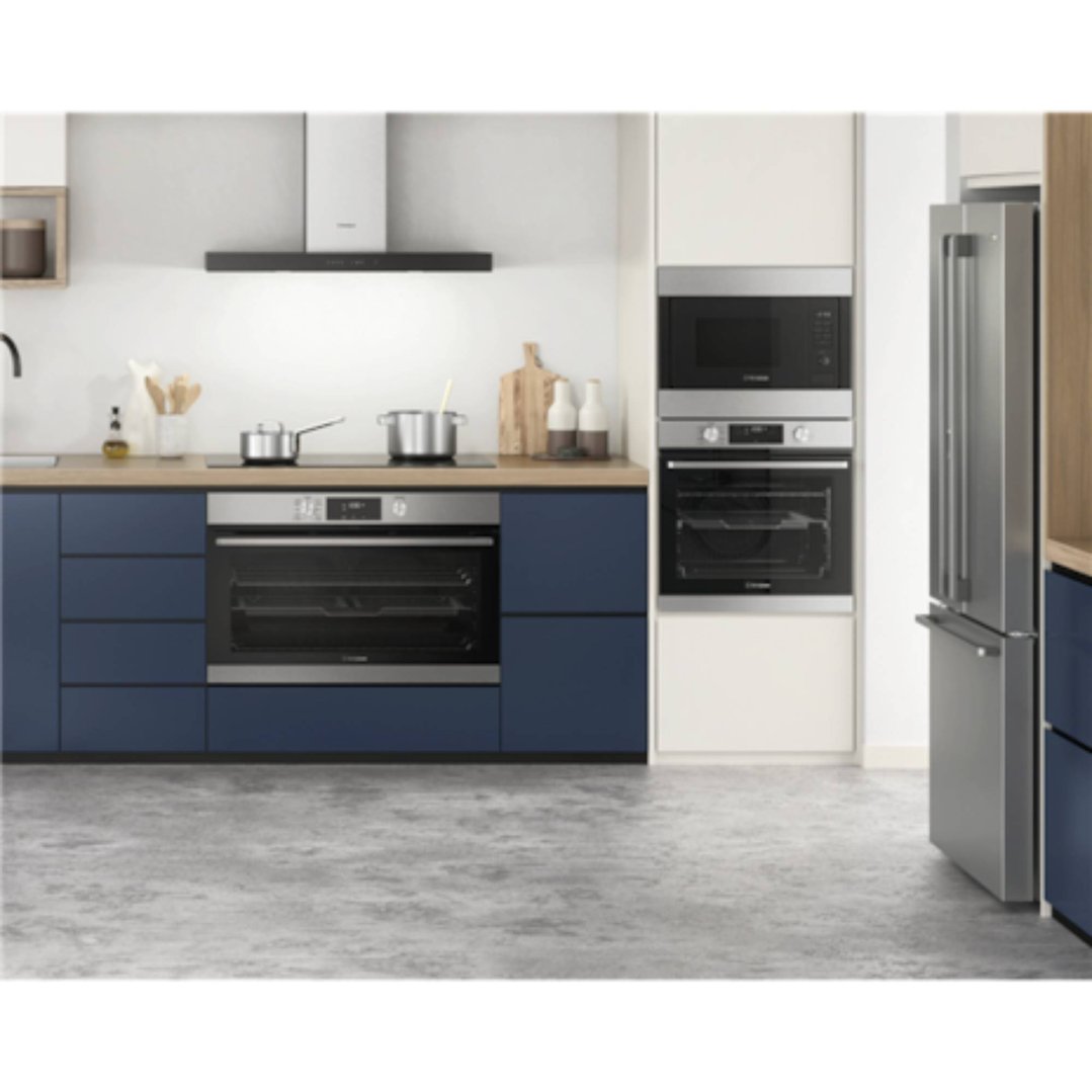 Modern kitchen with built-in microwave oven, wall oven, and refrigerator