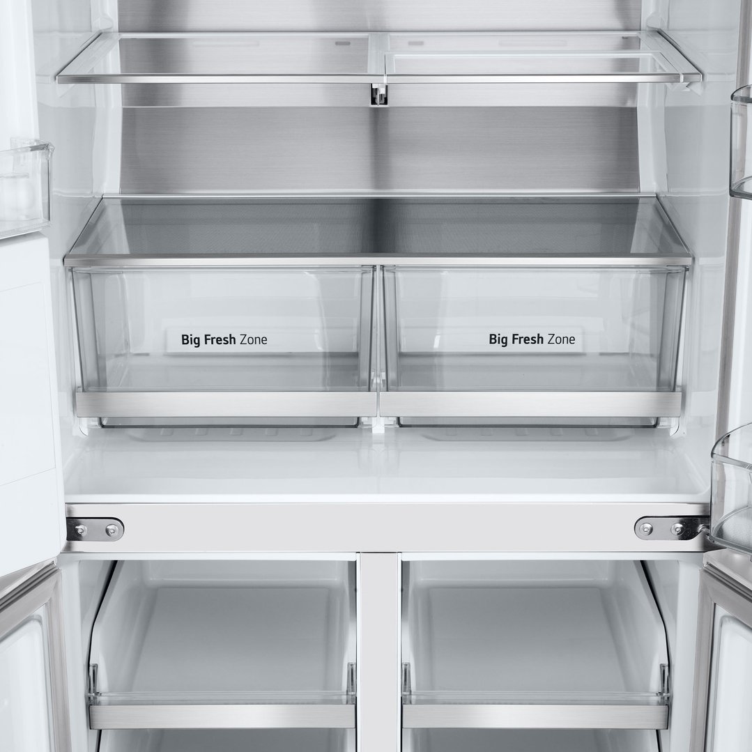 Open interior of a LG fridge with shelves and two 'Big Fresh Zone' drawers