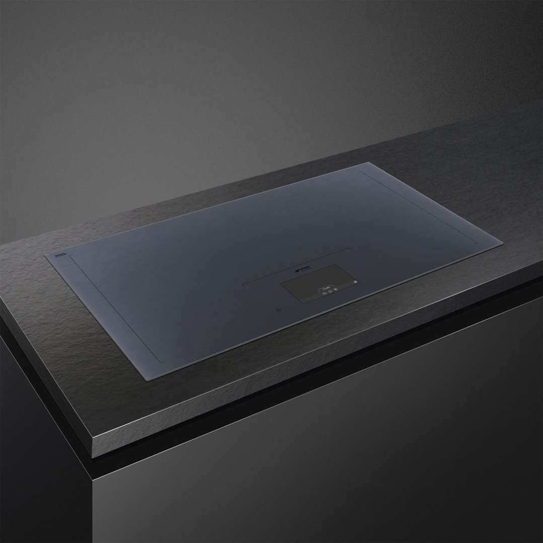 Linea 93cm Area Induction Cooktop in a dark kitchen setting
