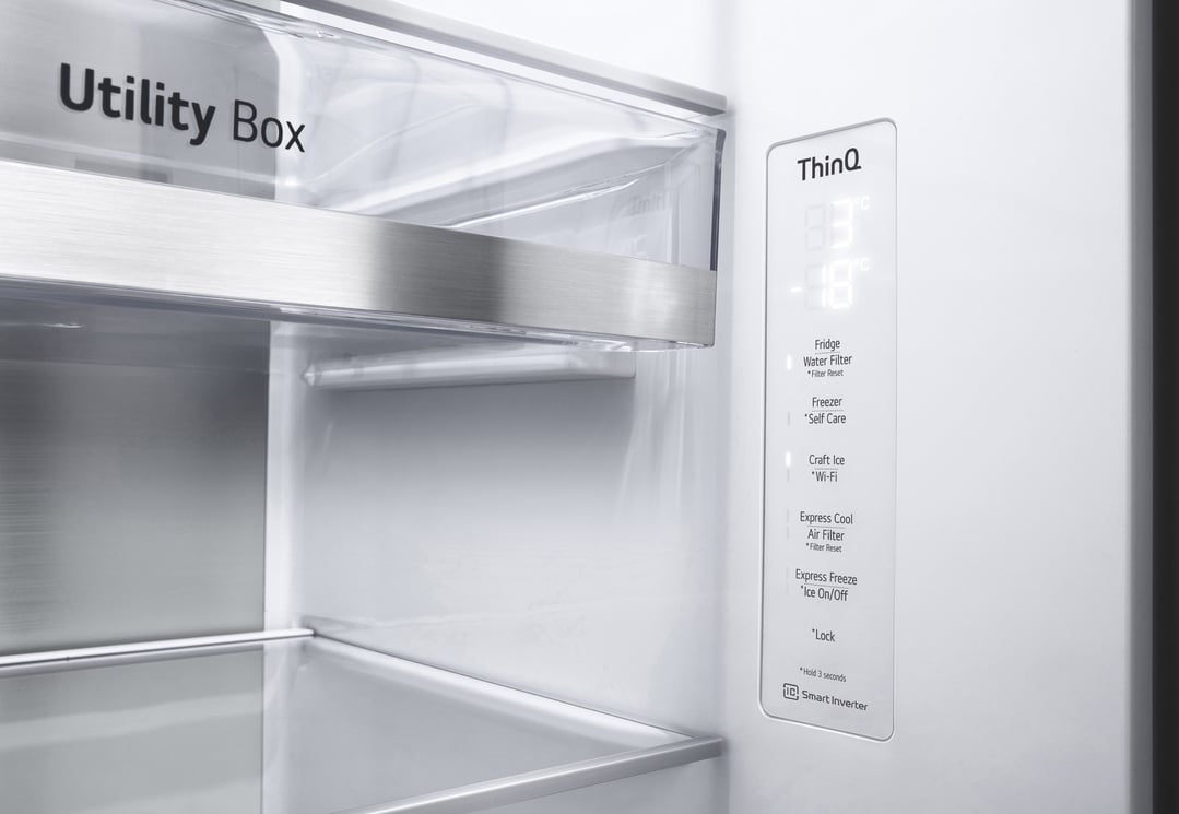 Interior view of a fridge showing the utility box and control panel