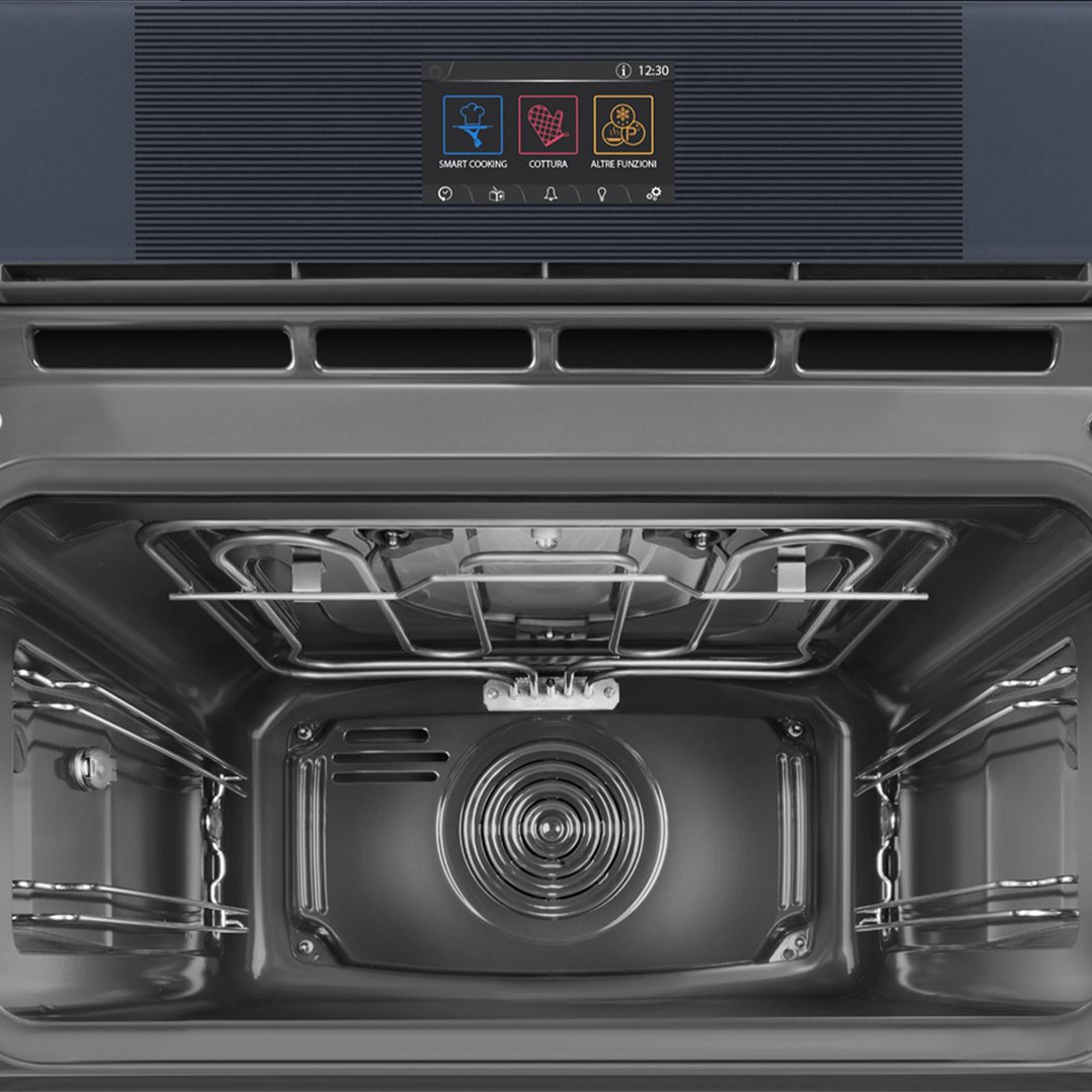 Close up of the open microwave oven interior and control panel