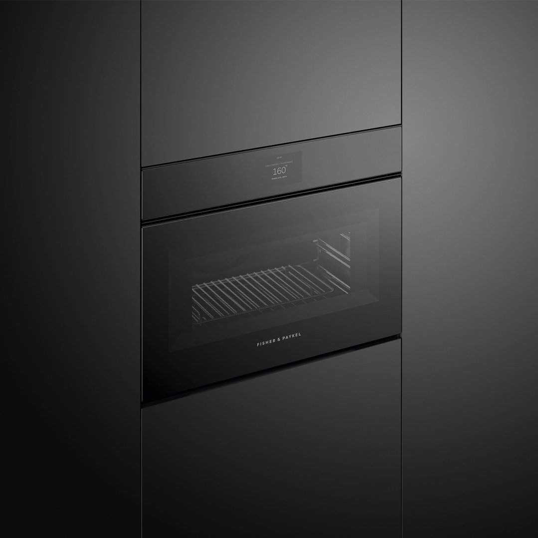 Black built-in compact combi-microwave oven with display showing 160 degrees Celsius