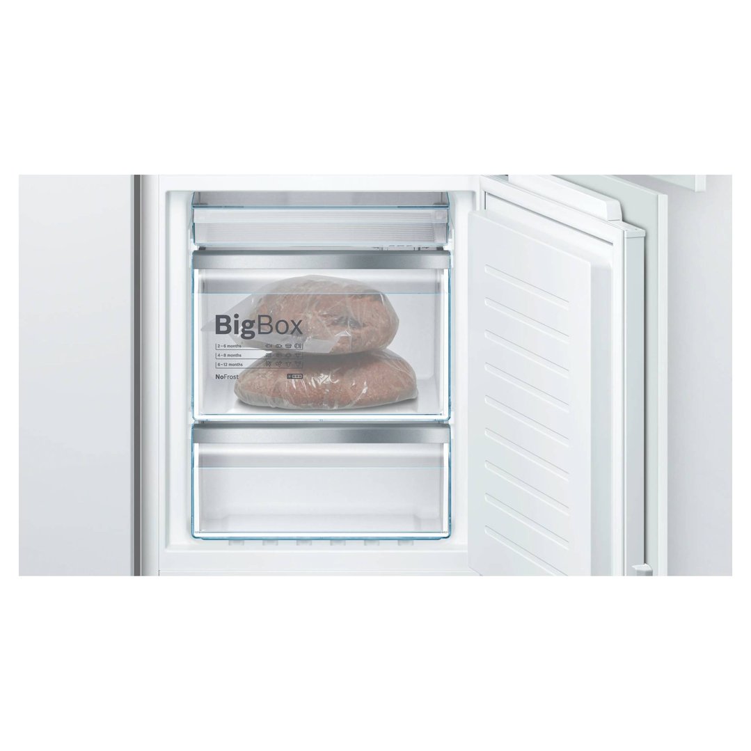 Open built-in fridge-freezer showing the freezer compartment with BigBox drawer