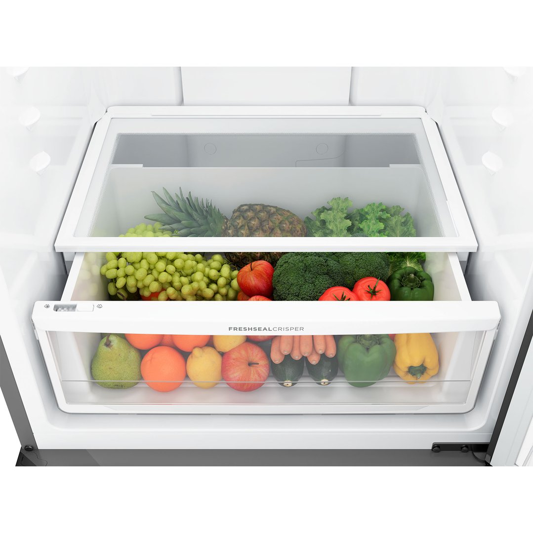Top-down view of the fridge's crisper drawers filled with fresh produce