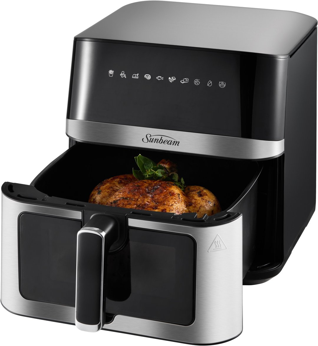 Black and silver air fryer with a cooked chicken inside, drawer partially open