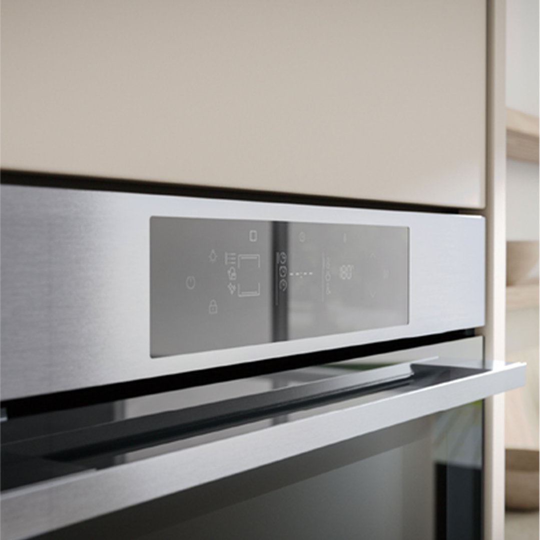 Close up of a built-in oven with a digital display in a kitchen setting