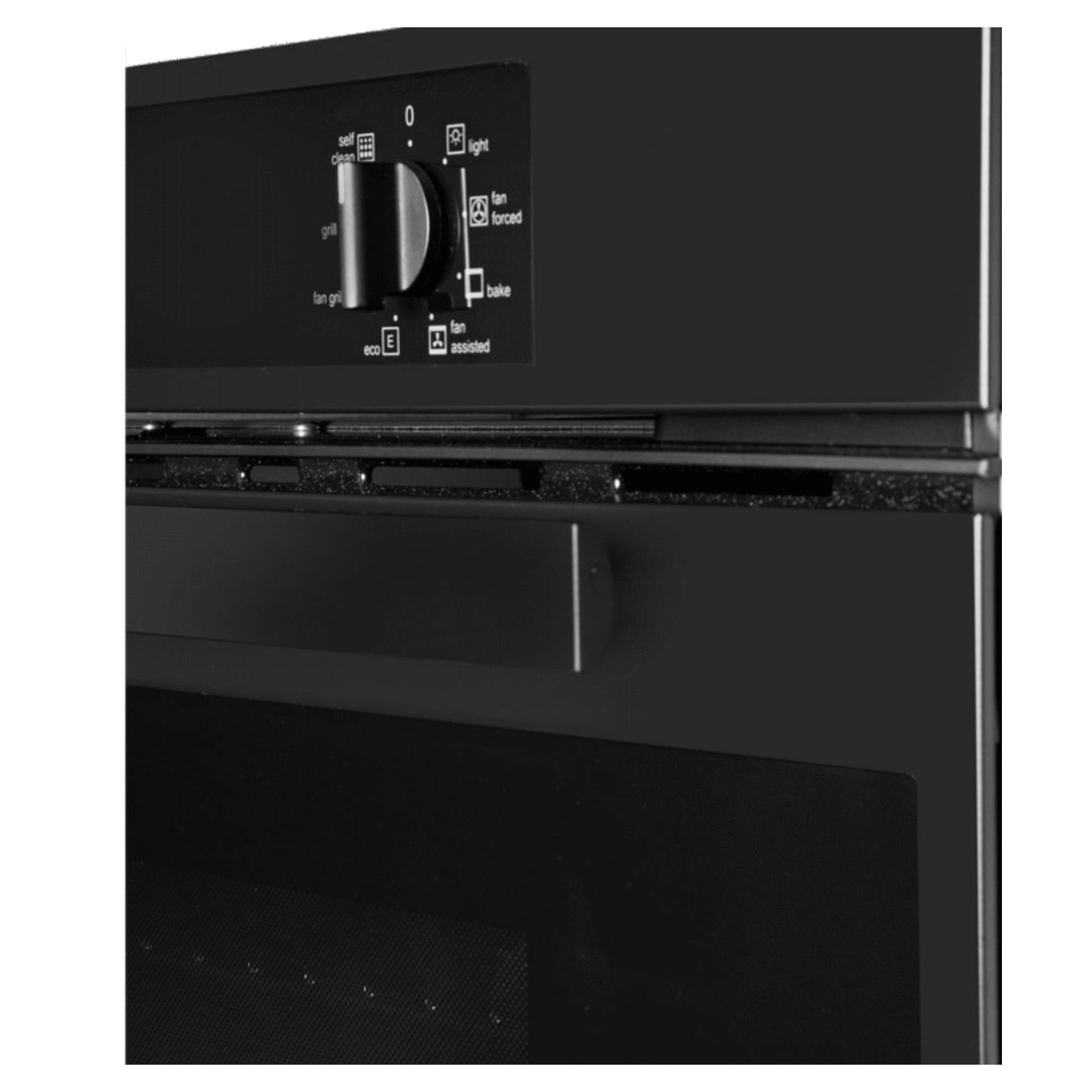 Close up of the control knob and settings on a matte black built-in oven