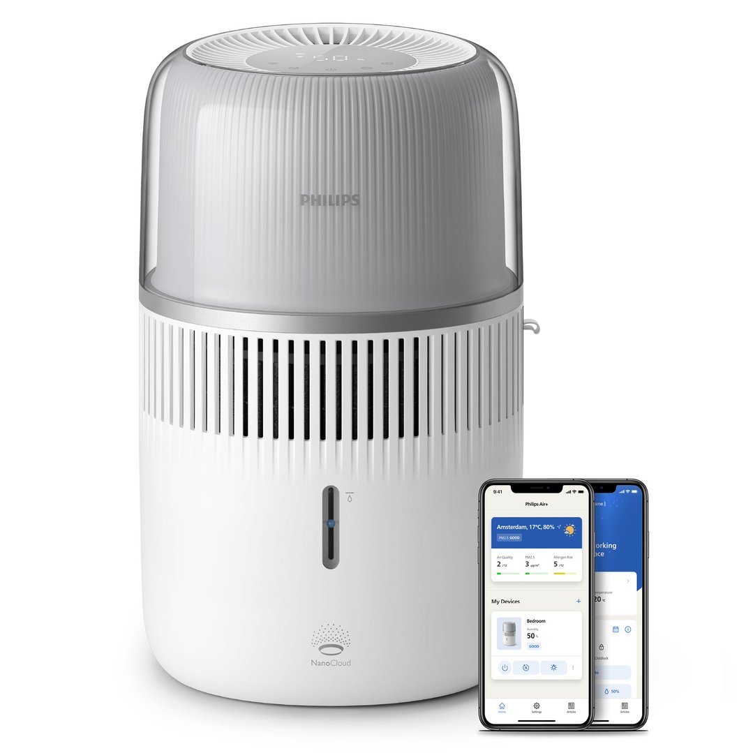 Philips Series 5000 Evaporative Humidifier with two smartphones displaying its app