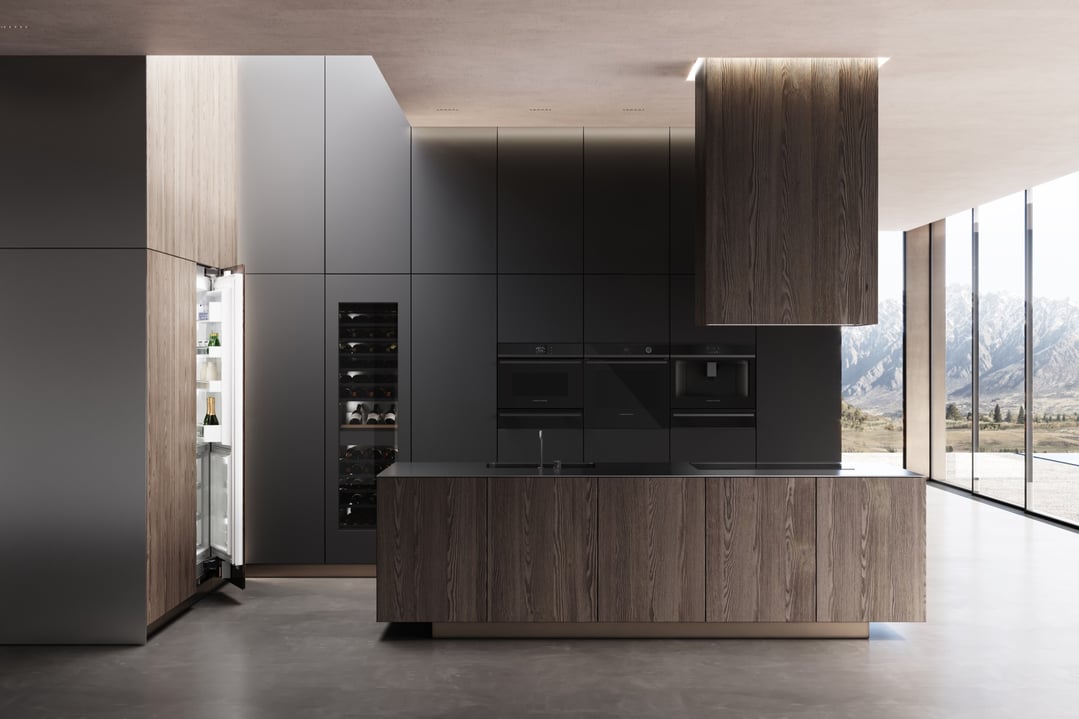 Integrated kitchen with open refrigerator, wine cooler, and built-in appliances