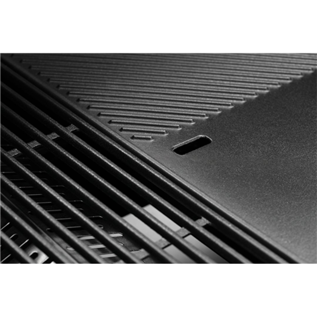 Close up of the grill and griddle plates of a barbecue