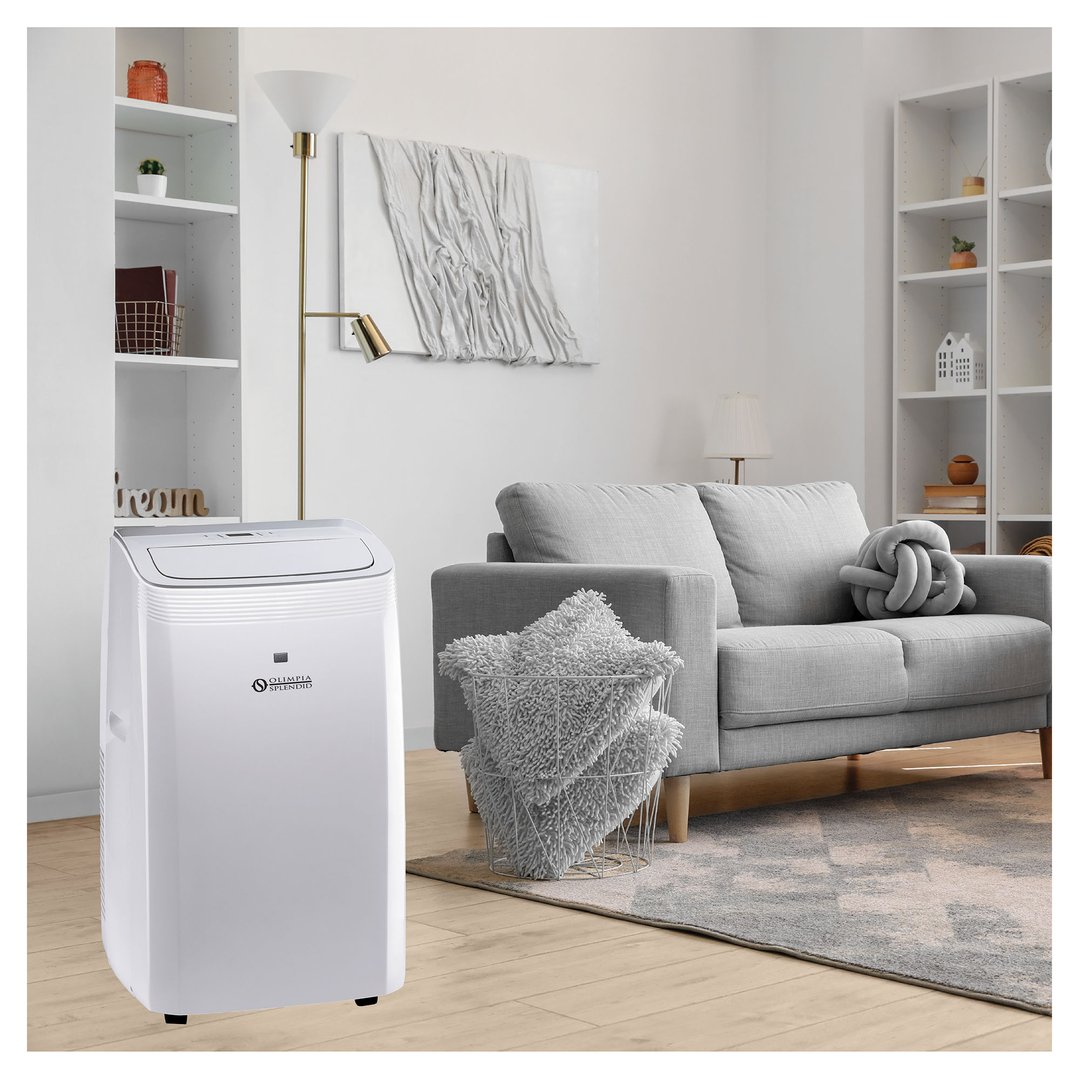White portable air conditioner in a modern living room with a grey sofa