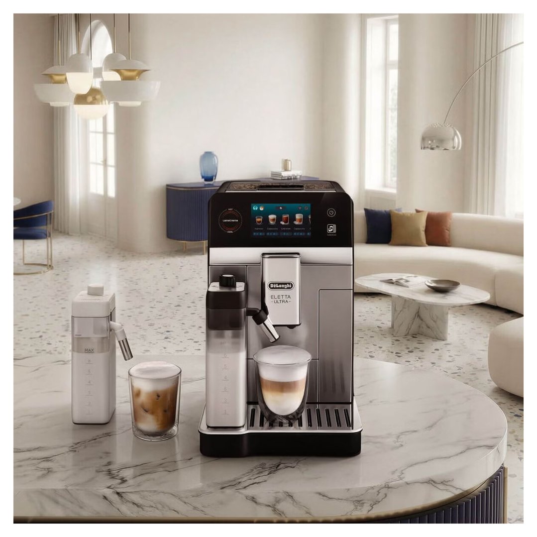 DeLonghi Eletta Ultra coffee machine on a marble table in a living room