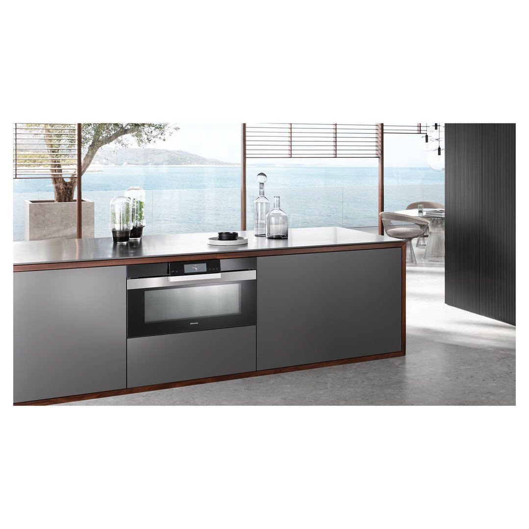 Built-in oven in a modern kitchen island with a sea view
