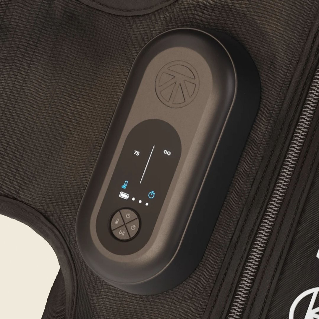 Close-up of the control panel on a black massager with a digital display