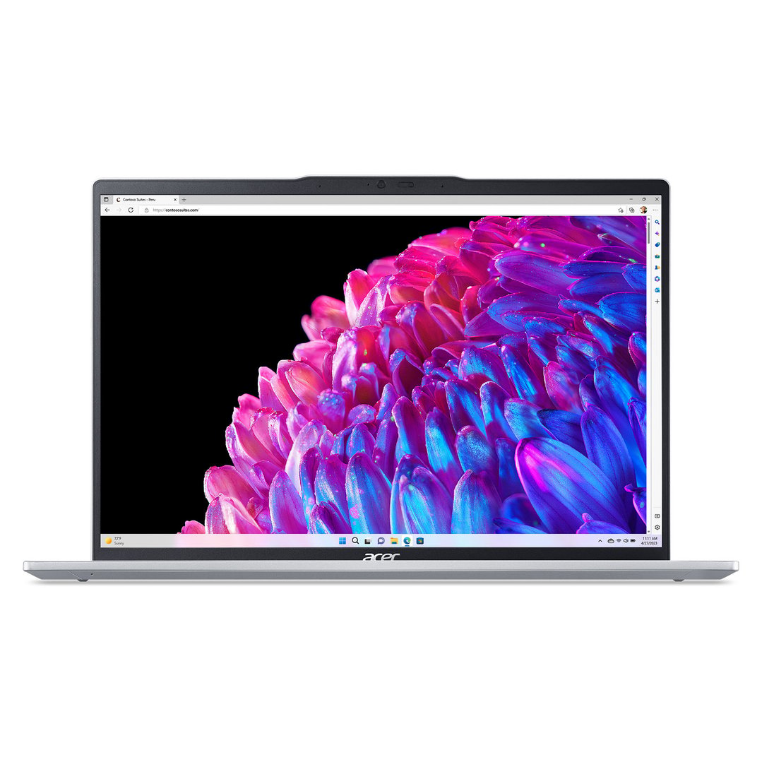 Acer laptop displaying a vibrant image of pink and blue flowers on its screen