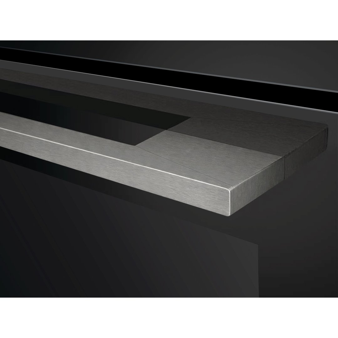 Close up of the brushed metal handle on a black built-in oven