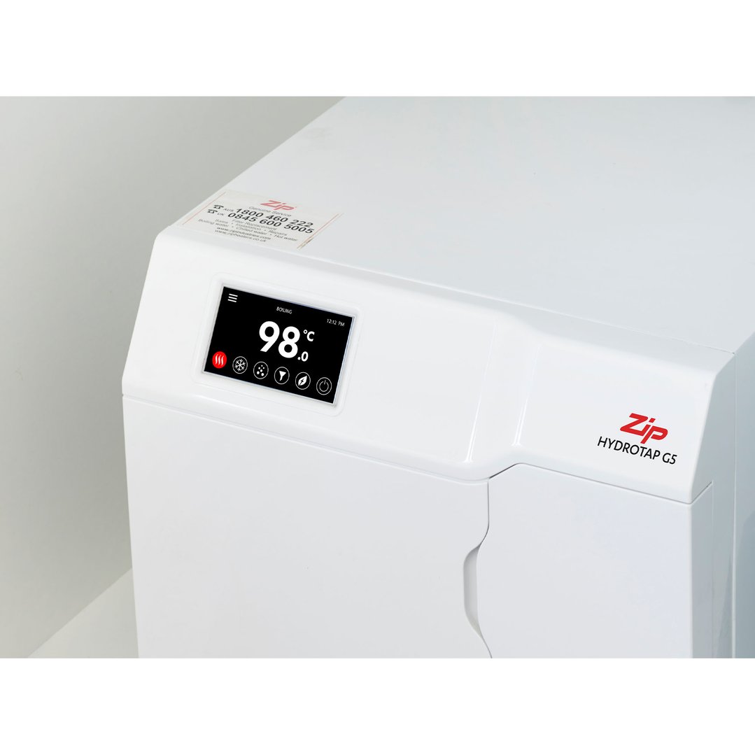 Close-up of a white ZIP HydroTap G5 with a digital display showing 98 degrees