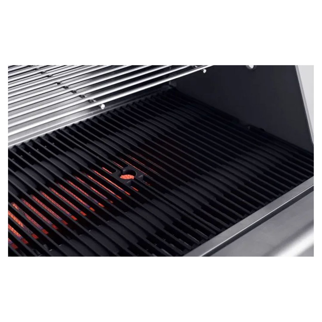 Close up of the grill grates with glowing red heat underneath