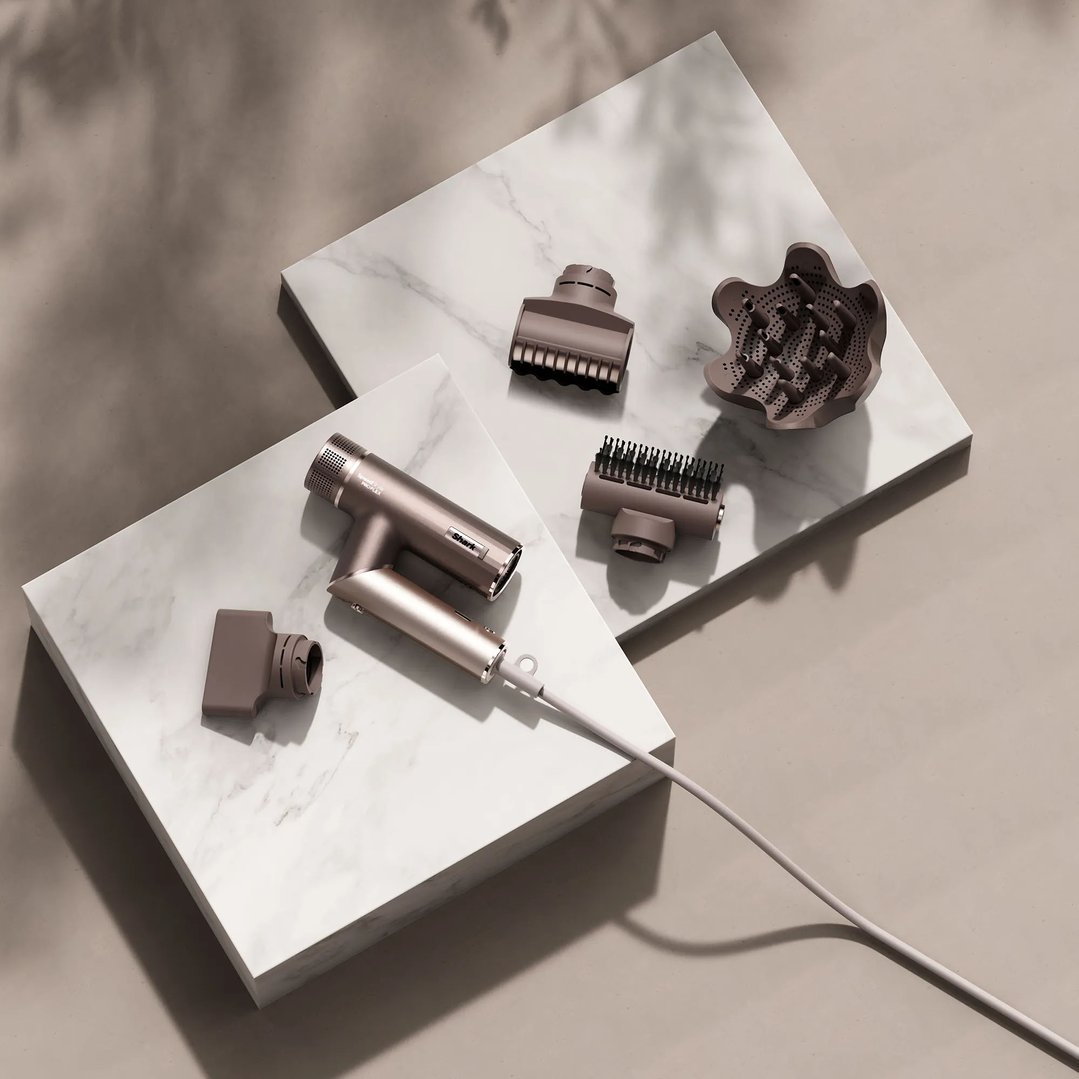 Shark SpeedStyle Pro FLEX Hair Dryer System and attachments on two marble blocks