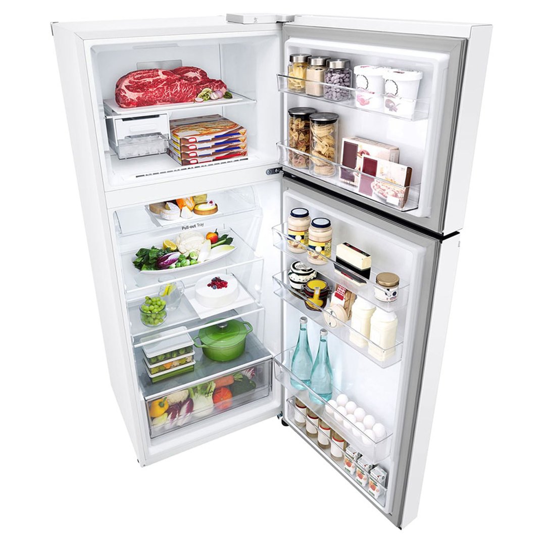 Open white LG top mount fridge filled with food and drinks