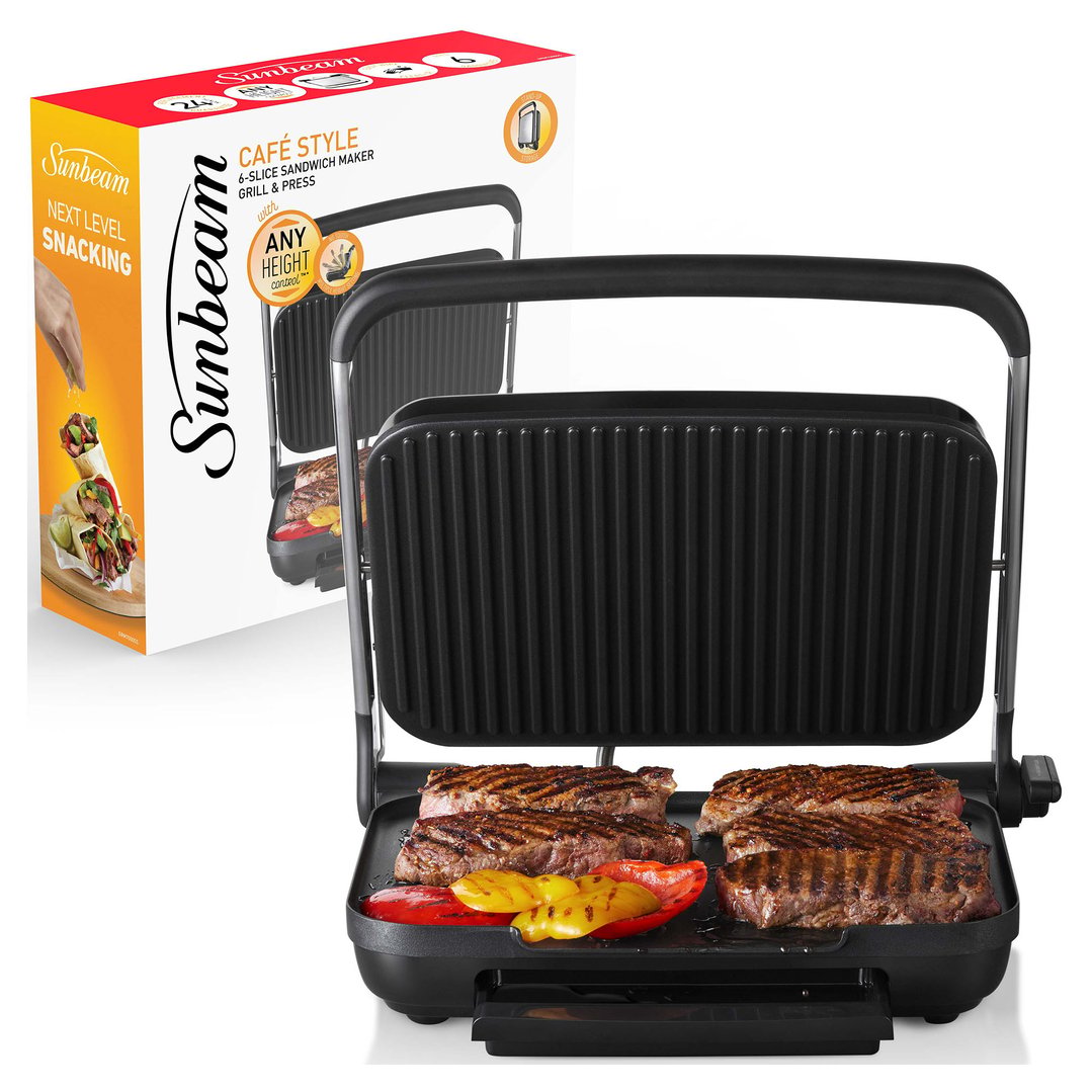 Sunbeam Café Style sandwich press and maker grilling steaks and vegetables with its box