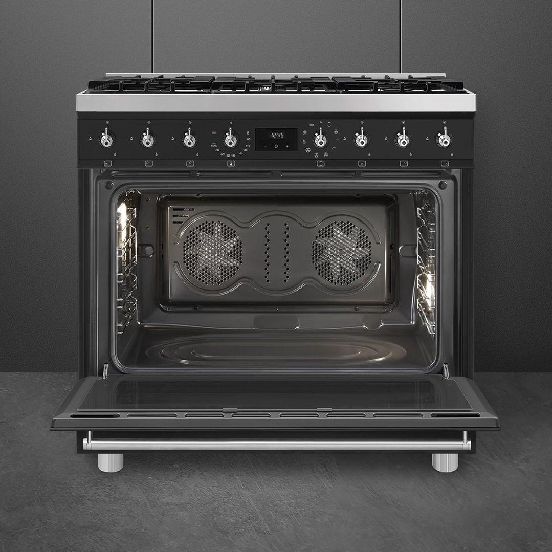 SMEG freestanding oven with door open, showing interior and controls