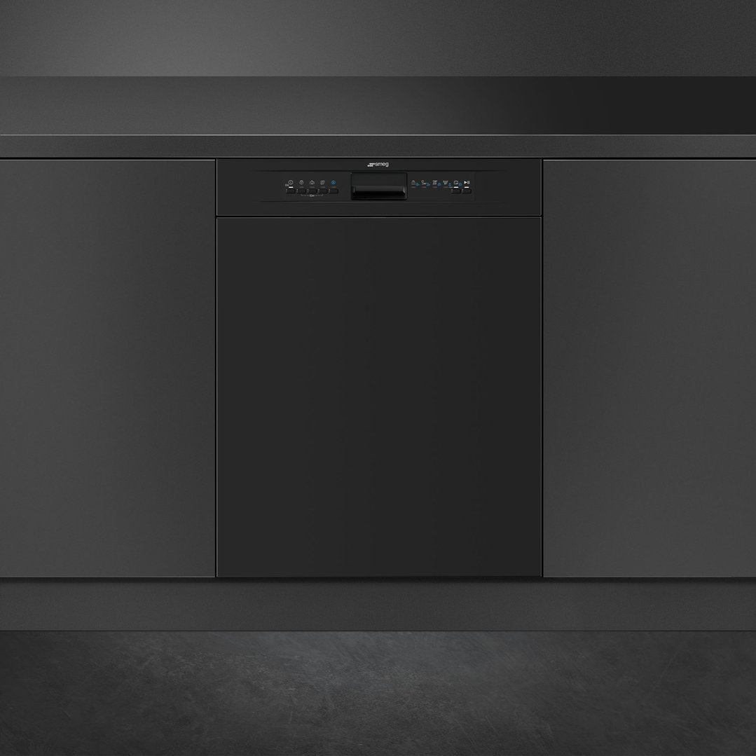 Matte black dishwasher integrated into dark kitchen cabinetry with a dark countertop