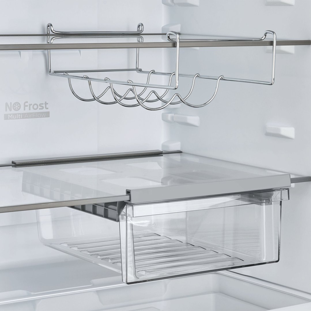Interior view of a fridge showing shelves, a wine rack, and a drawer