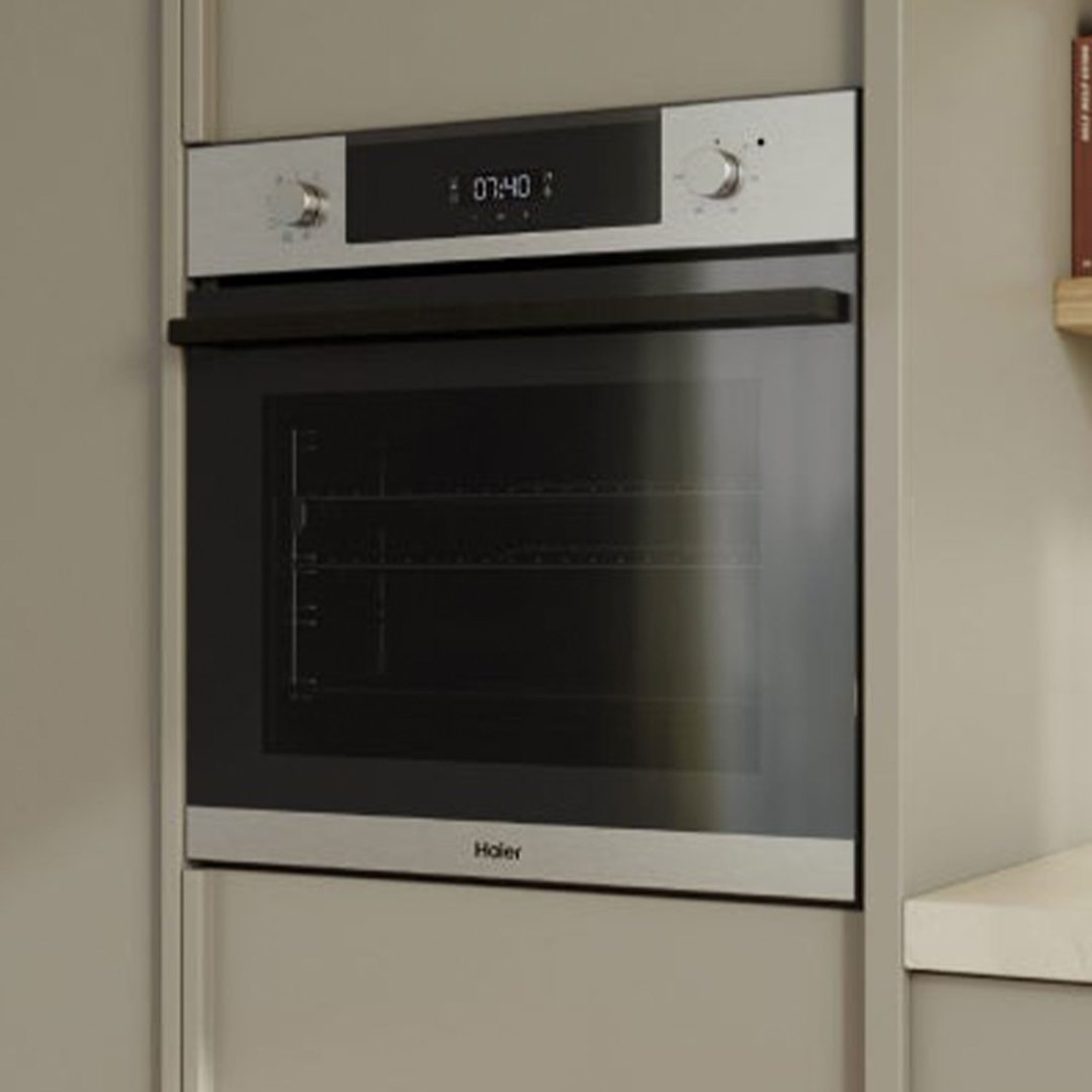 Built-in oven with a digital display showing 07:40 in a kitchen setting