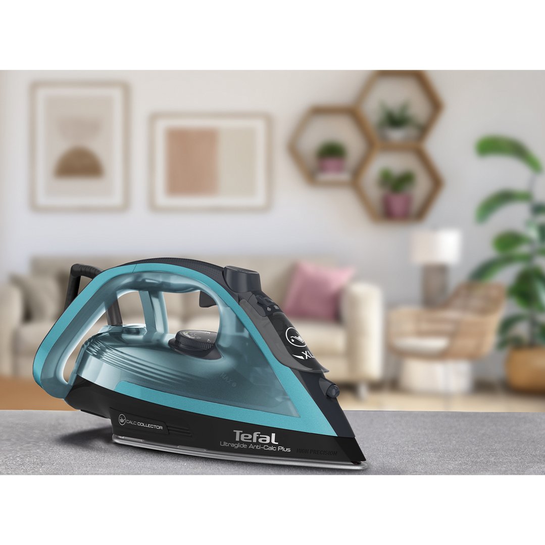 Tefal Ultraglide Anti-Calc Plus iron on a grey surface in a living room