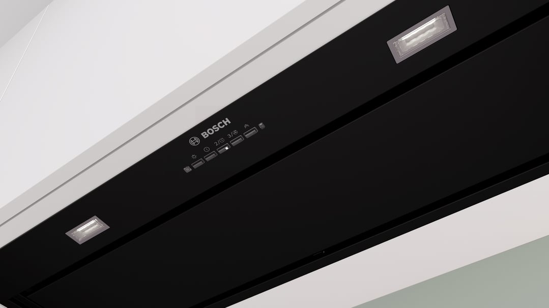 Close up of a black Bosch rangehood with controls and lights
