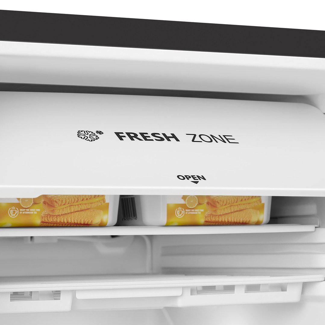 Close up of the interior of a fridge with a fresh zone compartment
