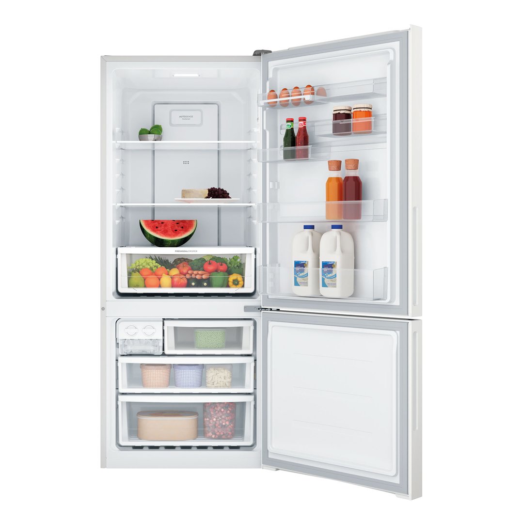 Open white bottom mount fridge with food and drinks inside