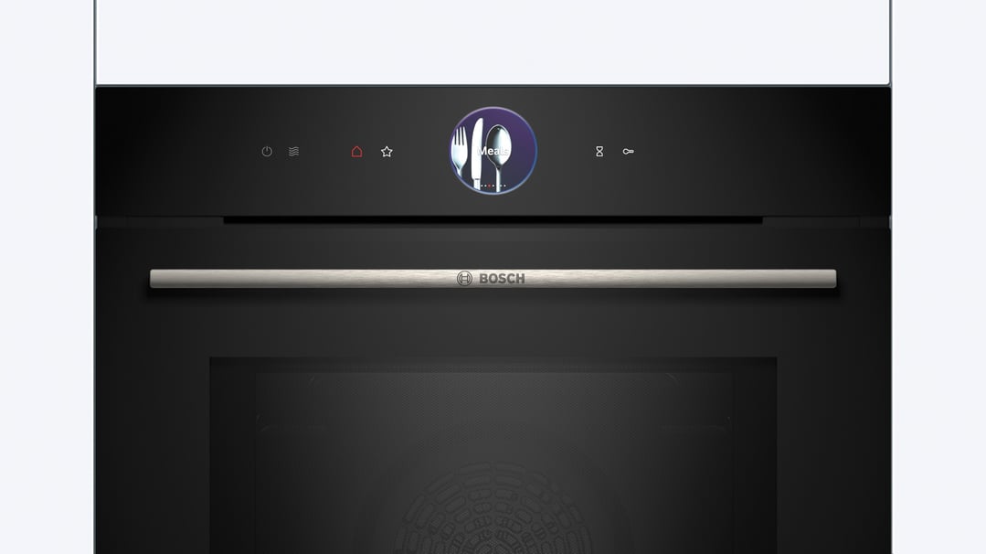 Black built-in Bosch oven with a digital display showing meal options
