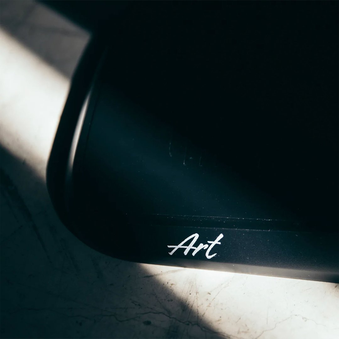 Close up of a black Art sparkling water maker with "Art" branding