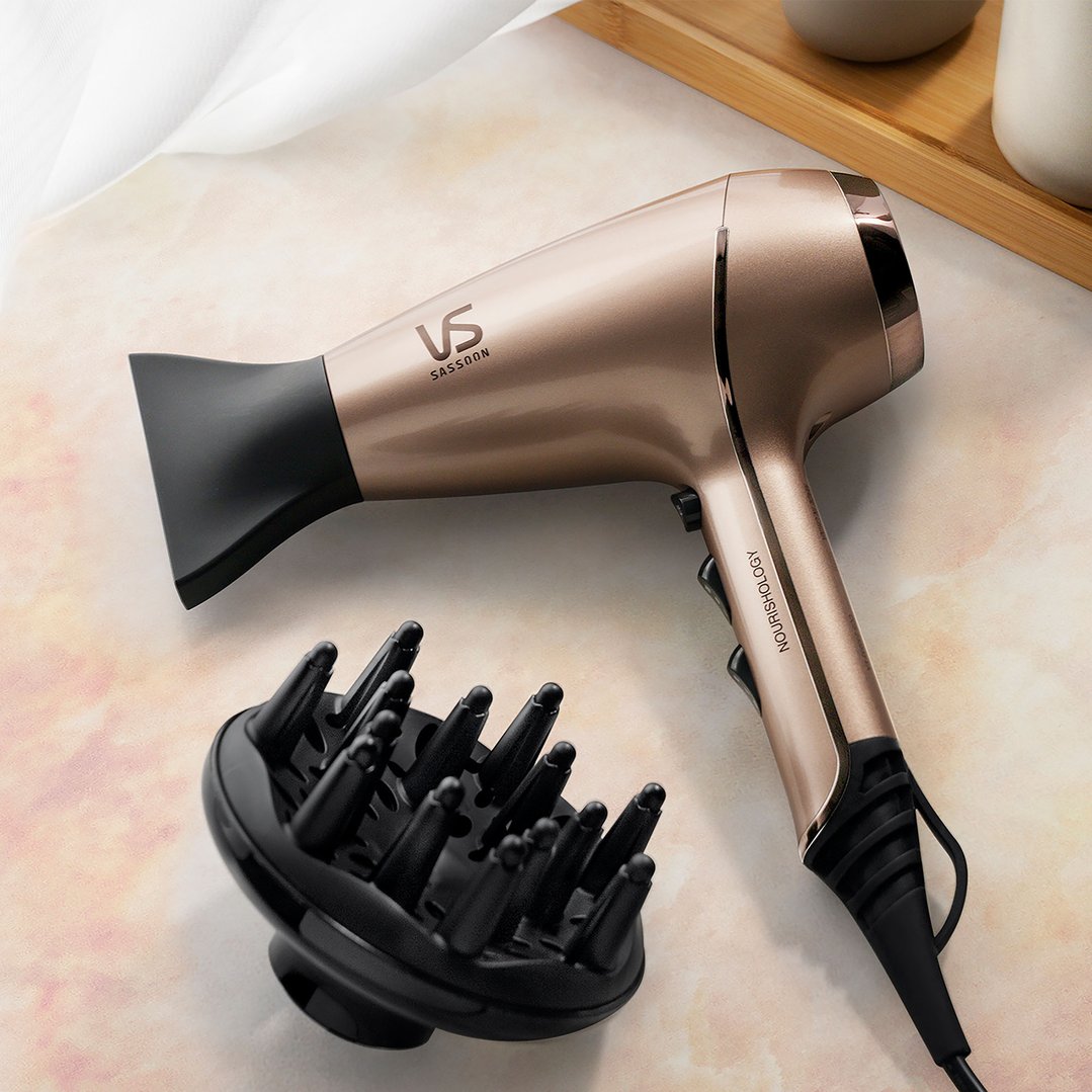 VS Sassoon Nourishology hair dryer and diffuser on a light-colored surface
