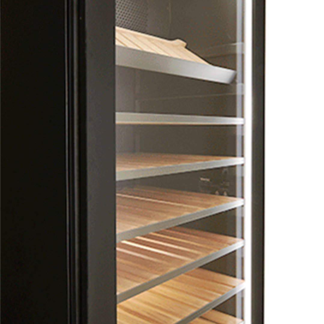 Close up of a wine cabinet interior with wooden shelves