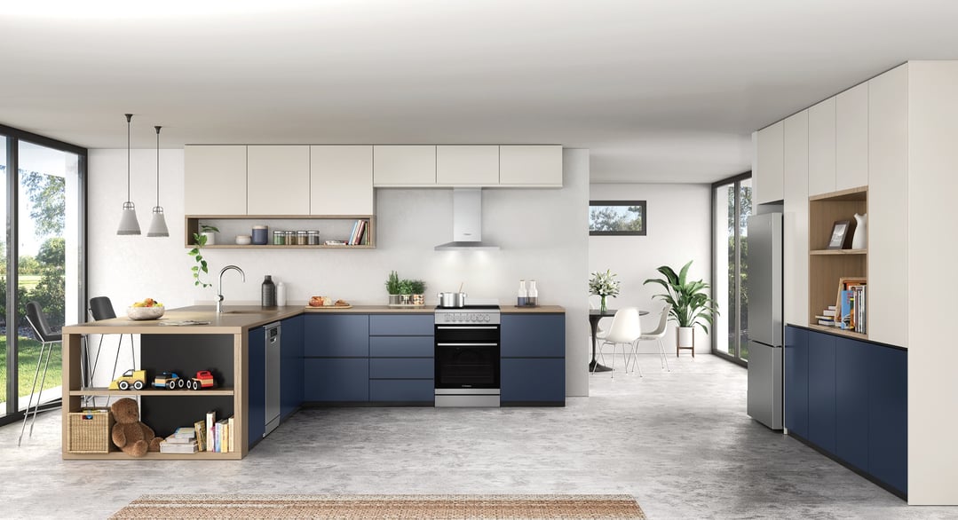 A stainless steel canopy rangehood in a modern kitchen with blue and white cabinetry