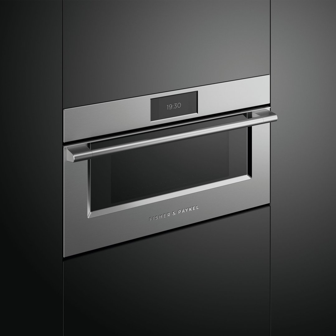 A built-in Fisher & Paykel microwave oven with a digital display showing 19:30