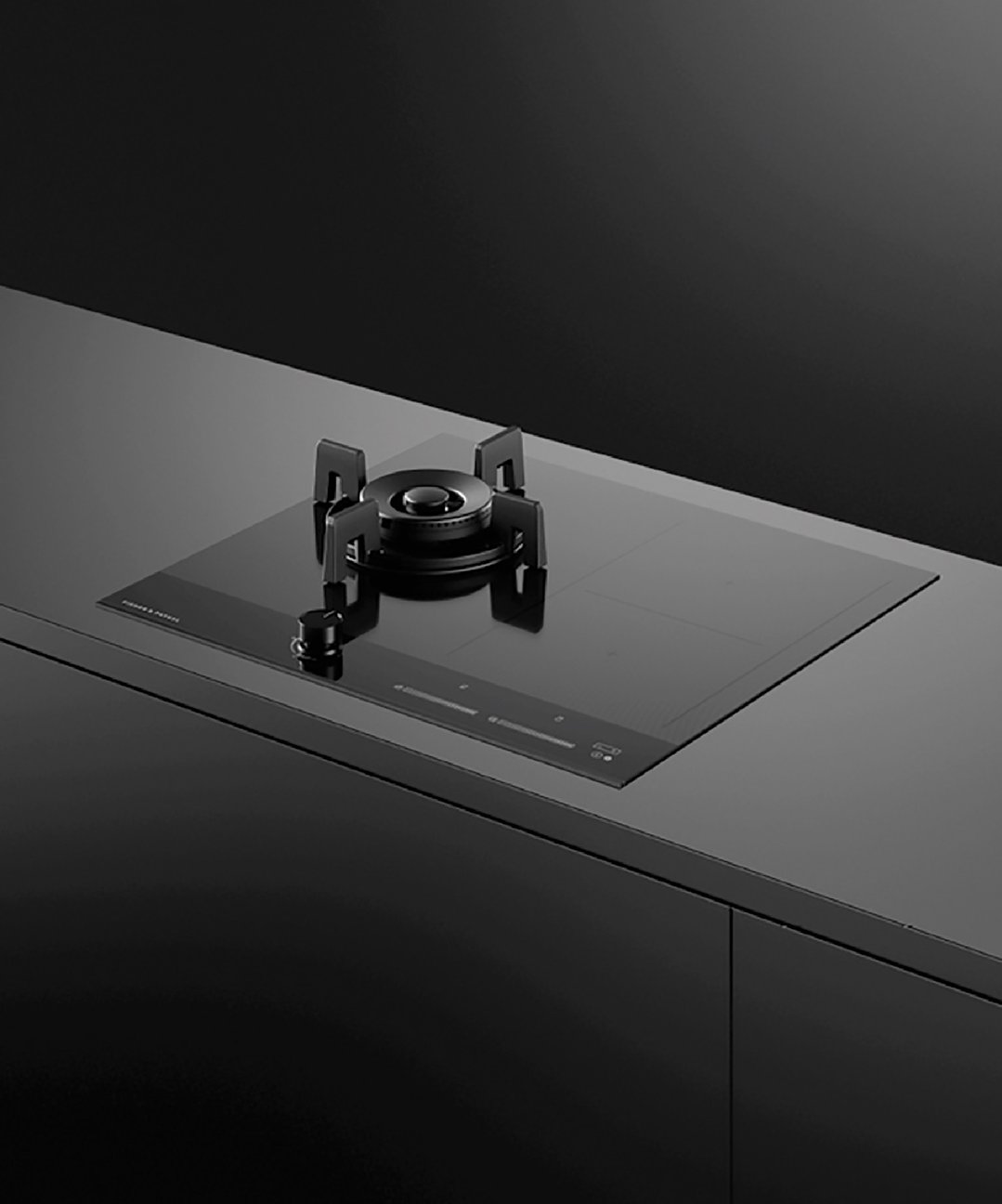 A black hybrid cooktop with one gas burner and two induction zones
