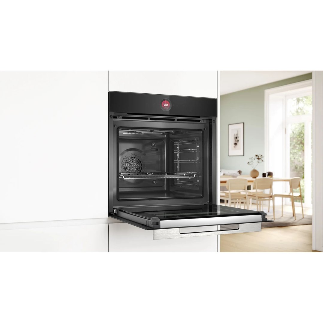 Built-in Bosch Series 8 oven with door open in a modern kitchen setting