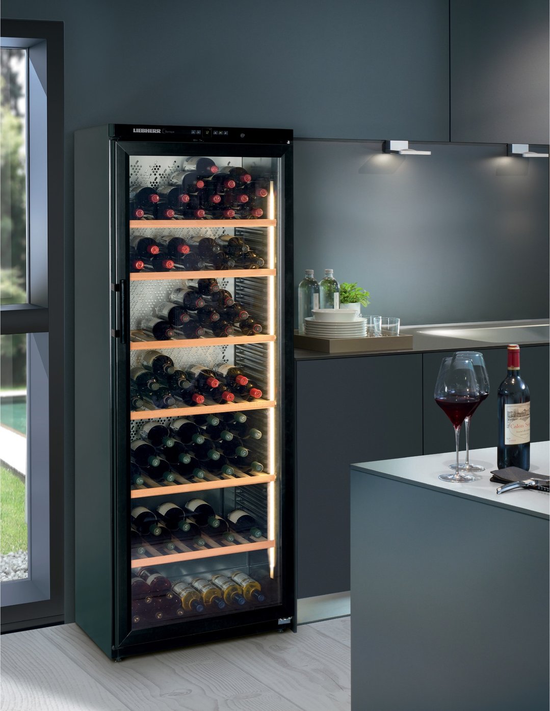 Liebherr wine cabinet in a modern kitchen setting with wine glasses