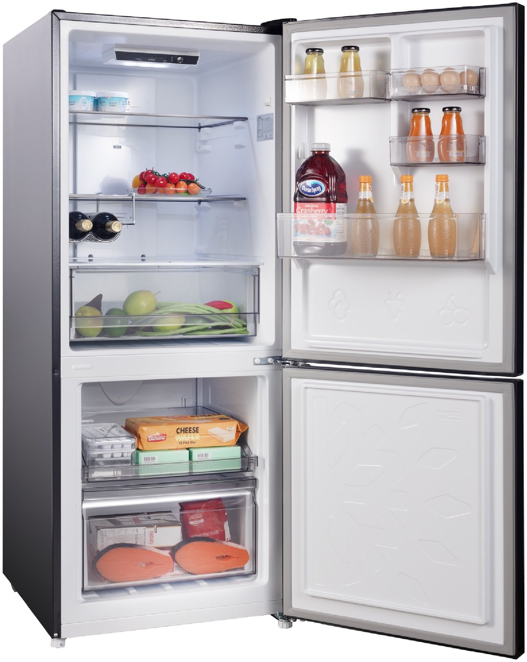 Open black steel bottom mount fridge with food and drinks inside