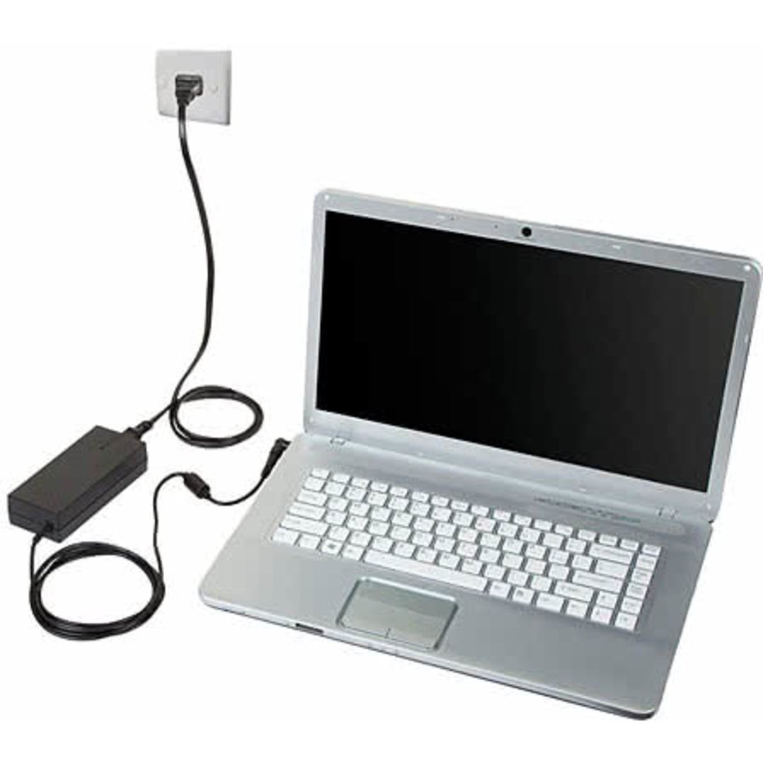 Laptop charger connected to a laptop and plugged into a wall socket